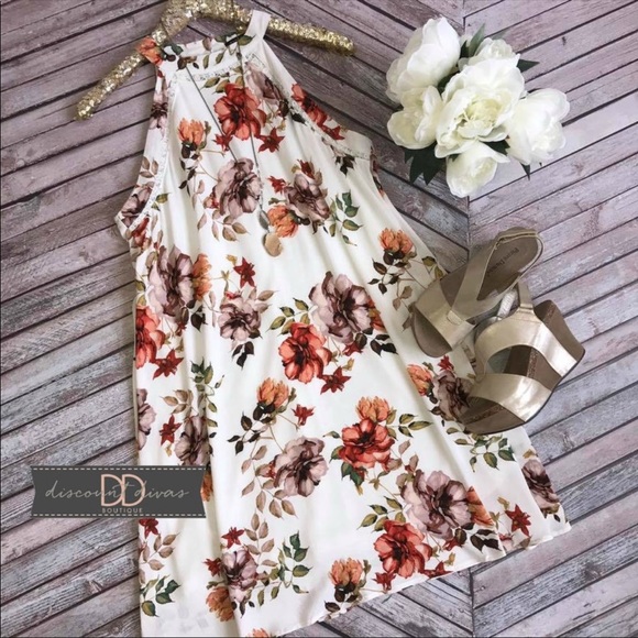 Staccato Dresses & Skirts - Floral print halter dress by Staccato